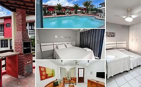 Casas no Residencial Mont Sinai com 2 ou 3 suítes (todas com ar), internet privativa 300MBPS a aproximadamento 250m da Praia de Taperapuã, condomínio com piscinas adulto e infantil, sauna, churrasqueiras e Segurança 24hrs.